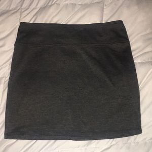 Tight sleek grey and black mini skirt